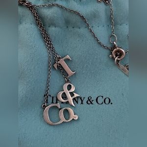 Tiffany & Co letter necklace.